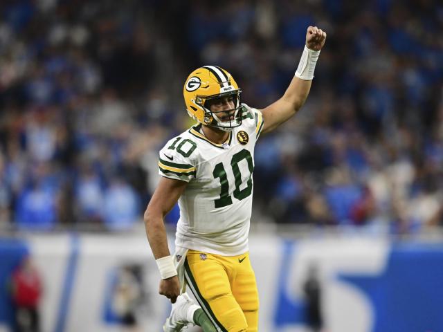 In an impressive performance, Love throws 3 touchdown passes and leads the Packers to a 29-22 victory over the first-place Lions in the NFC North division.