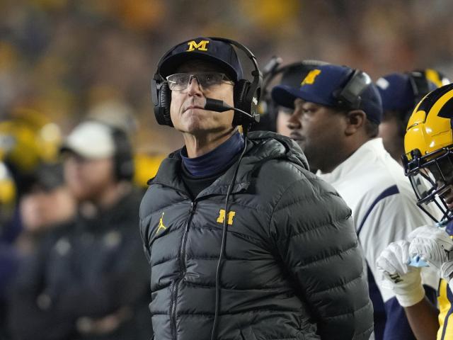Michigan's coach, Jim Harbaugh, has been prohibited from participating in the last three regular-season games due to accusations of stealing signs. This news was reported by WRALSportsFan.com.