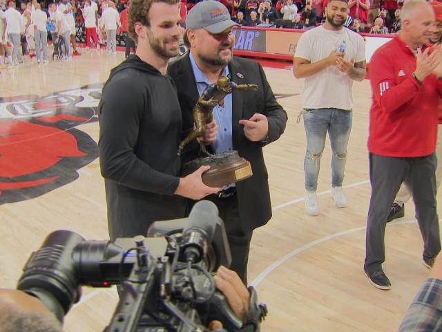At an NC State basketball game, Payton Wilson received a surprise award, the 2023 Dick Butkus Award, as reported by WRALSportsFan.com.