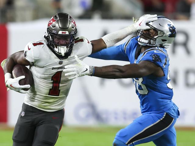 Evans scores on 75-yard TD, tops 1,000 yards for 10th straight year; Bucs beat Panthers 21-18 :: WRALSportsFan.com