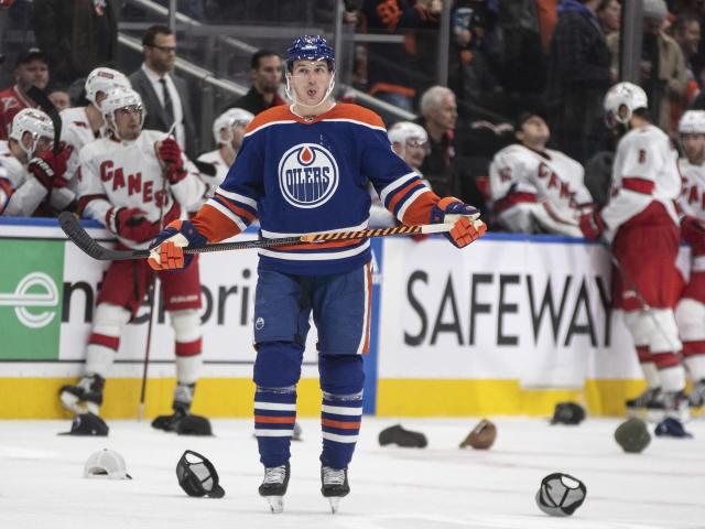 Hyman scored 3 goals and McDavid contributed 3 assists, leading the Oilers to a 6-2 victory over the Hurricanes for their 5th consecutive win.