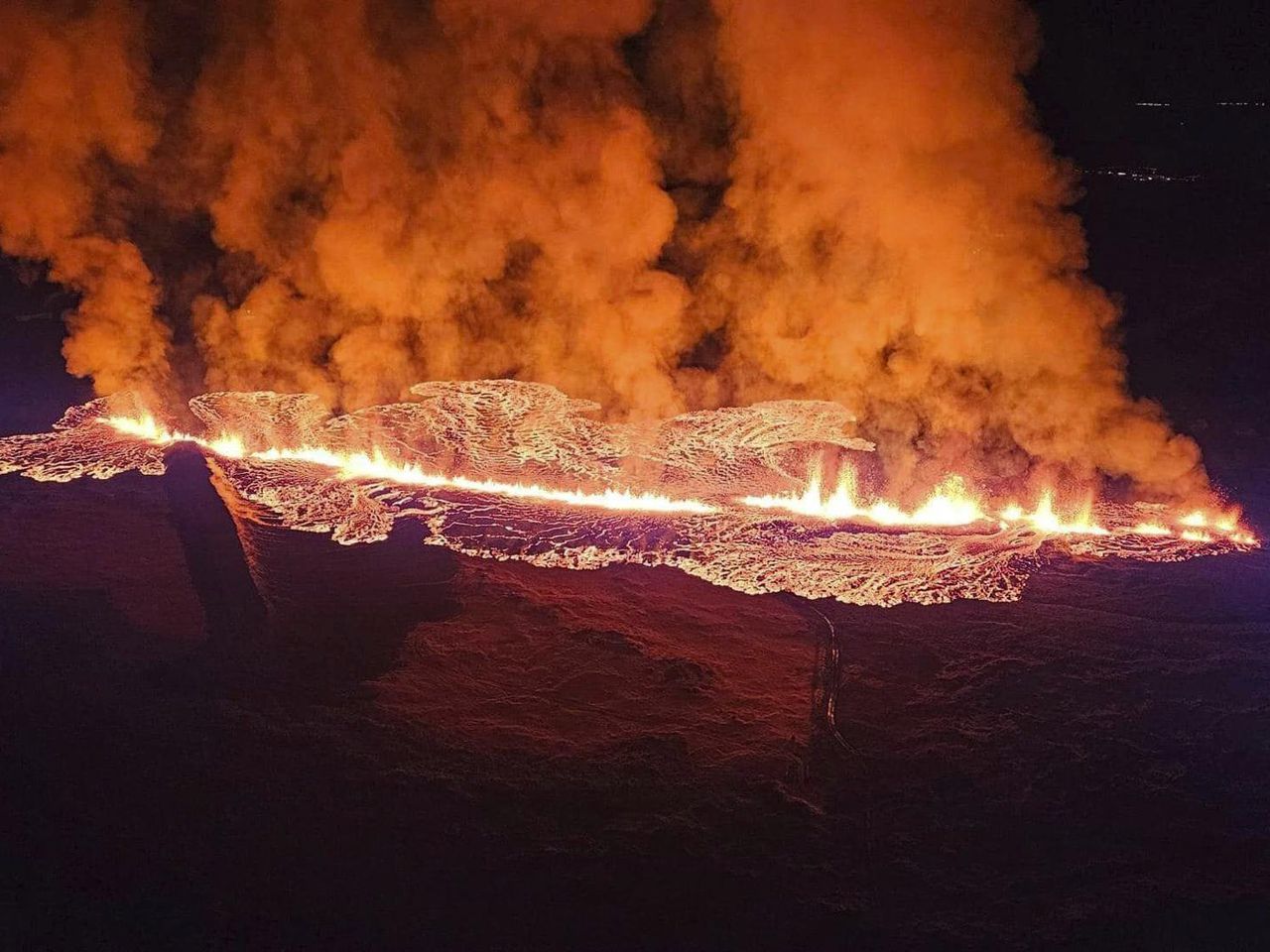 .

A volcanic eruption occurs in the southwest region of Iceland, causing molten lava to flow towards a nearby community.