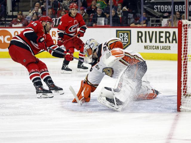 Jarvis guides the Hurricanes to a 6-3 victory against the Ducks, following the loss of their goaltender to injury.