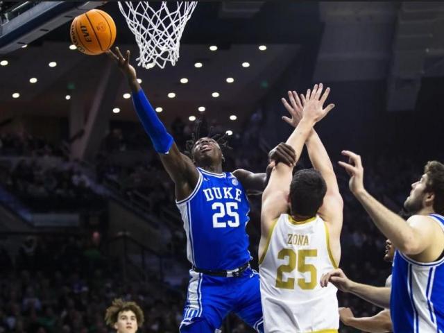 Mark Mitchell achieves a personal record of 23 points as the 14th ranked Duke defeats Notre Dame 67-59 on WRALSportsFan.com.