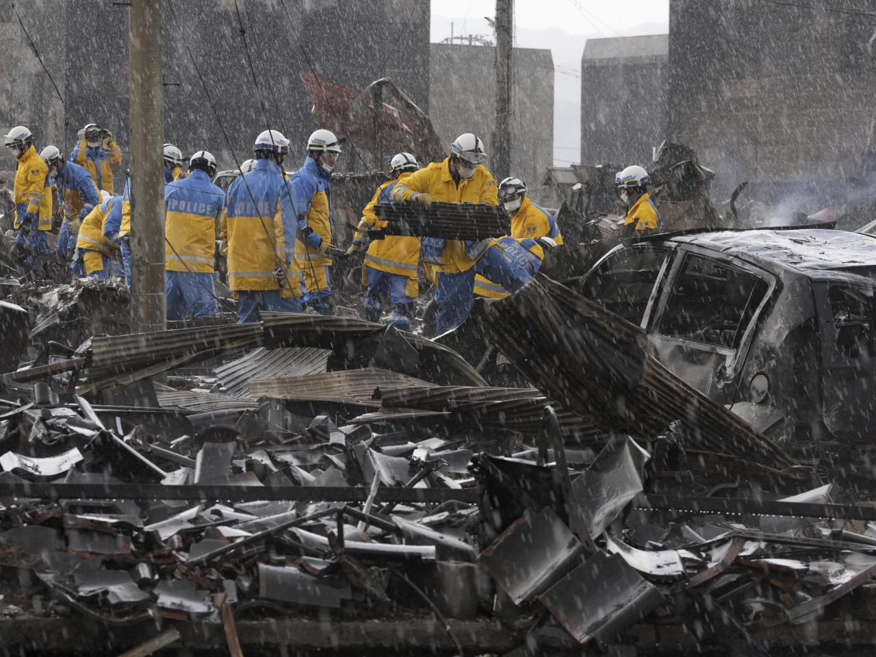 The number of fatalities from the earthquakes in western Japan has increased to 126, as precipitation in the form of rain and snow adds to the instability of the already unstable ground.