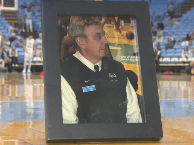 The University of North Carolina's basketball community pays tribute to the late John Schleich, who served as a floor usher for many years, on WRALSportsFan.com.