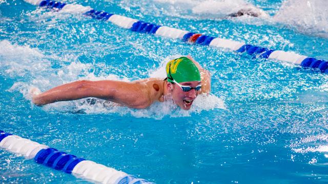Raleigh Charter High School had a dominant performance at the 1A/2A boys swimming championships, while West Davidson's Nebrich broke a new record.