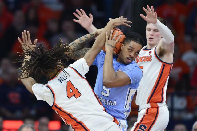 Syracuse shocks 7th-ranked North Carolina with 86-79 victory, seeking revenge for previous lopsided defeat in Chapel Hill.