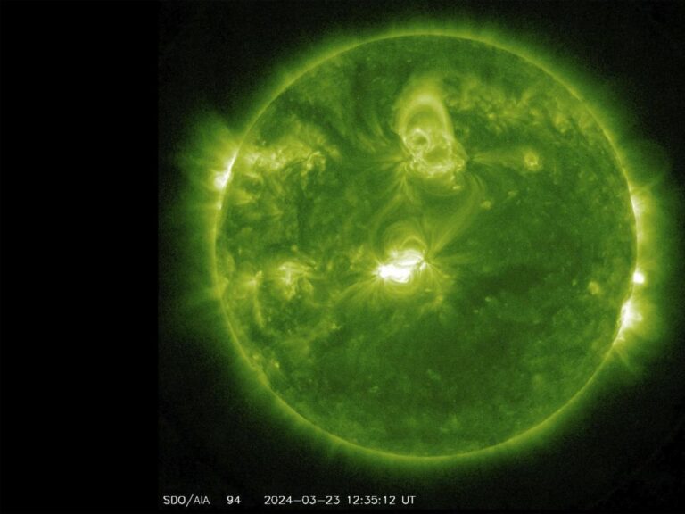 A strong solar flare can cause a geomagnetic storm that may interfere with radio transmissions and produce a spectacular aurora.