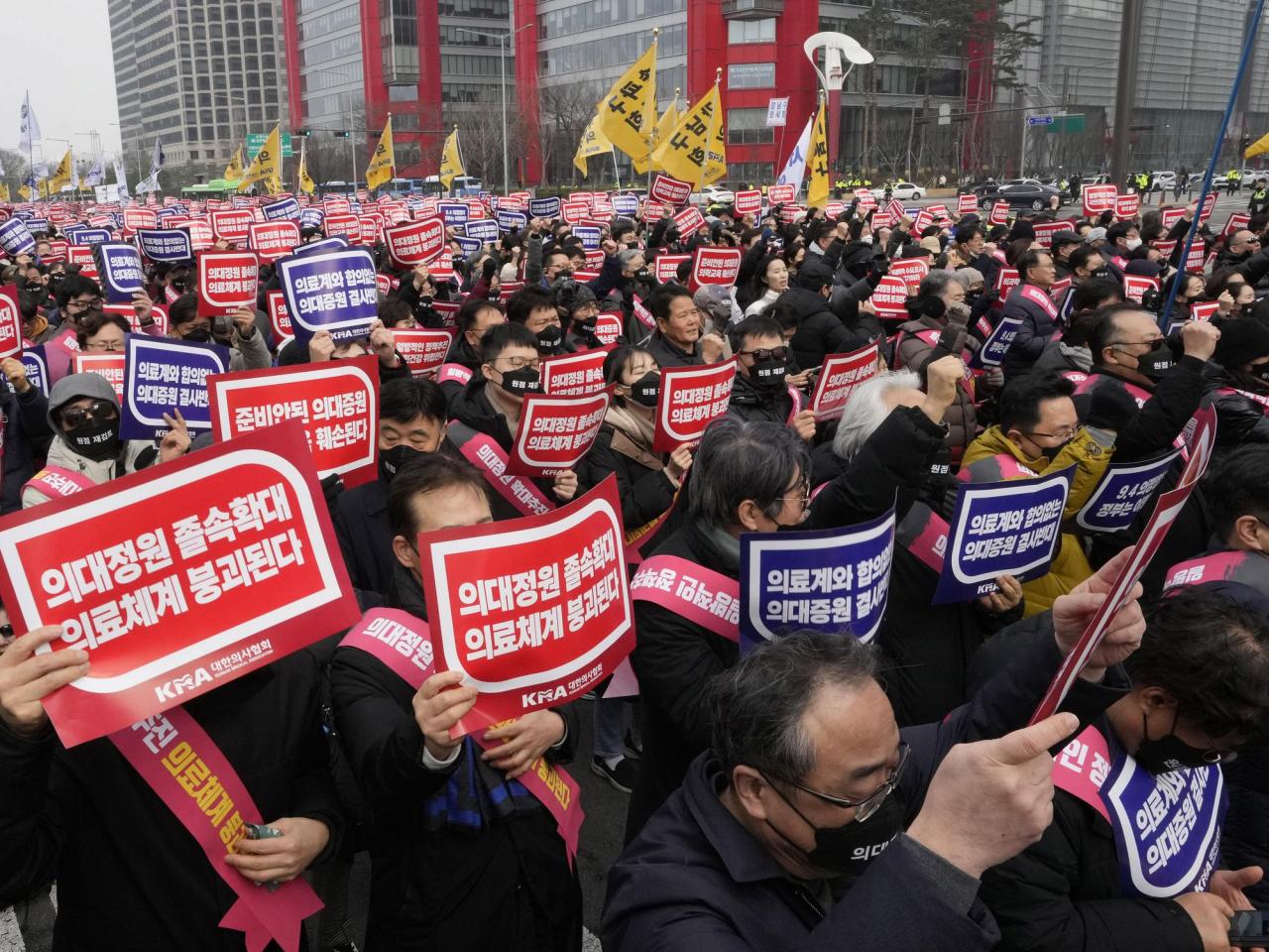 In response to the doctors' walkouts, the South Korean government has taken action by suspending the licenses of two senior doctors as a form of punishment.