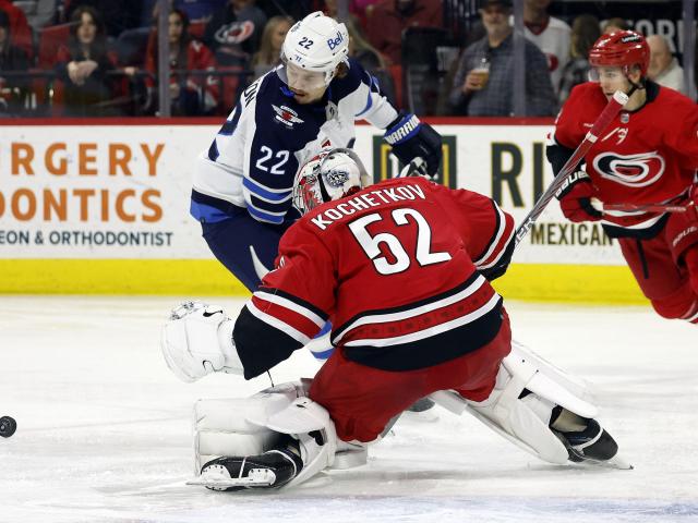 Monahan scores game-winning goal to lead Jets comeback for 5-3 win against Hurricanes on WRALSportsFan.com.