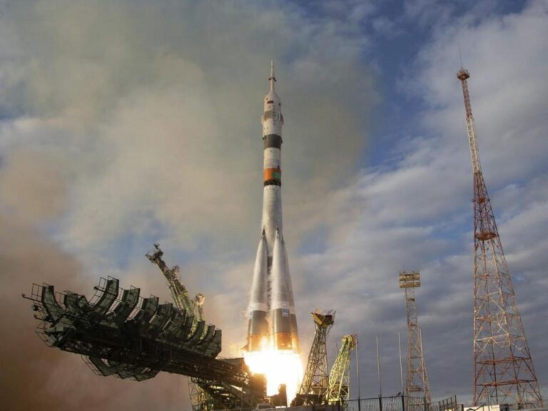 Russian Soyuz spacecraft with 3 astronauts docks at the International Space Station