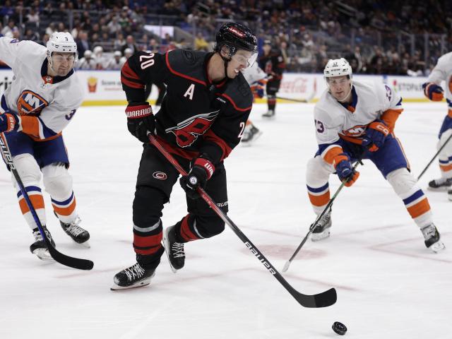 Seth Jarvis and Jake Guentzel lead the Hurricanes to a 4-1 victory over the struggling Islanders, extending their winning streak to four games.