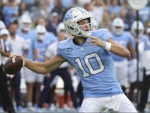 Williams, Maye, and Daniels, all quarterbacks, are predicted to be the top three picks in the upcoming NFL draft. However, wide receiver Harrison could potentially shake up that prediction. This information is reported on WRALSportsFan.com.