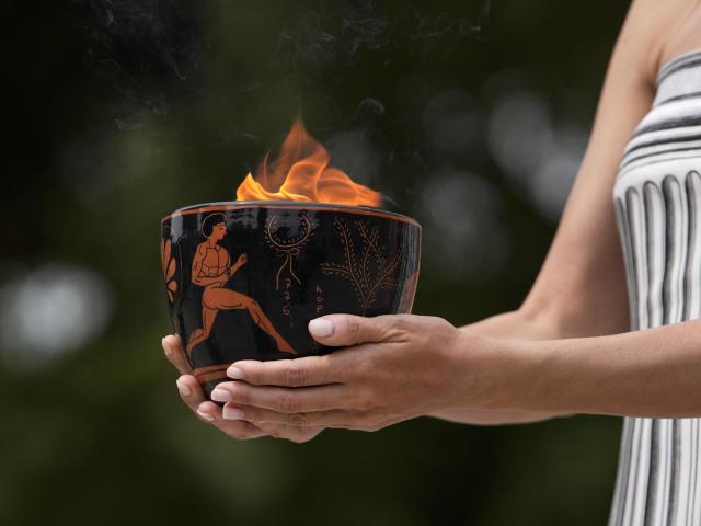 Despite weather glitch, the Paris Olympics flame is lit at the Greek cradle of ancient games :: WRALSportsFan.com