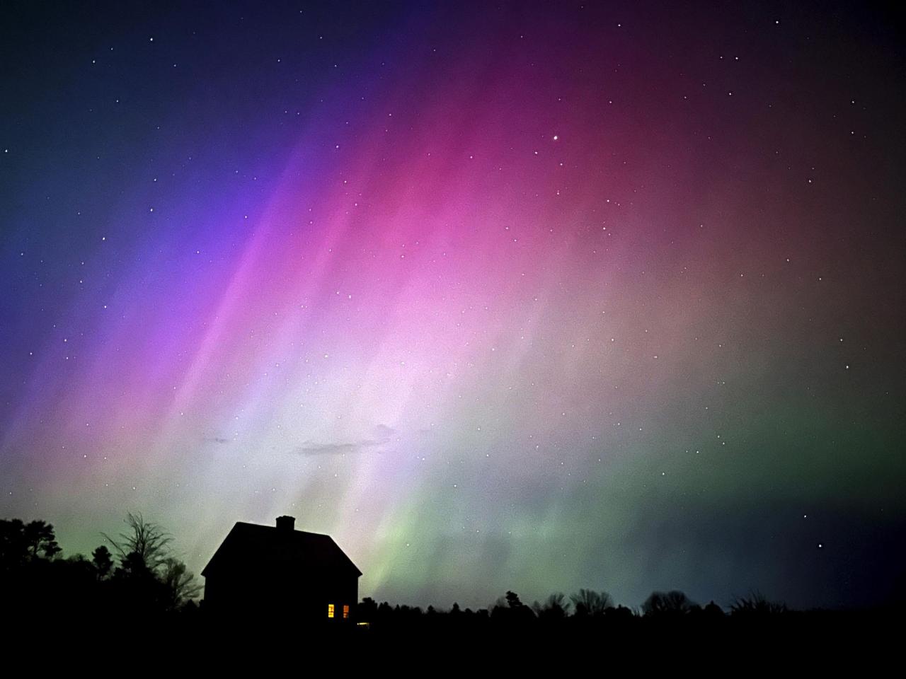 Solar storm puts on brilliant light show across the globe, but no serious problems reported