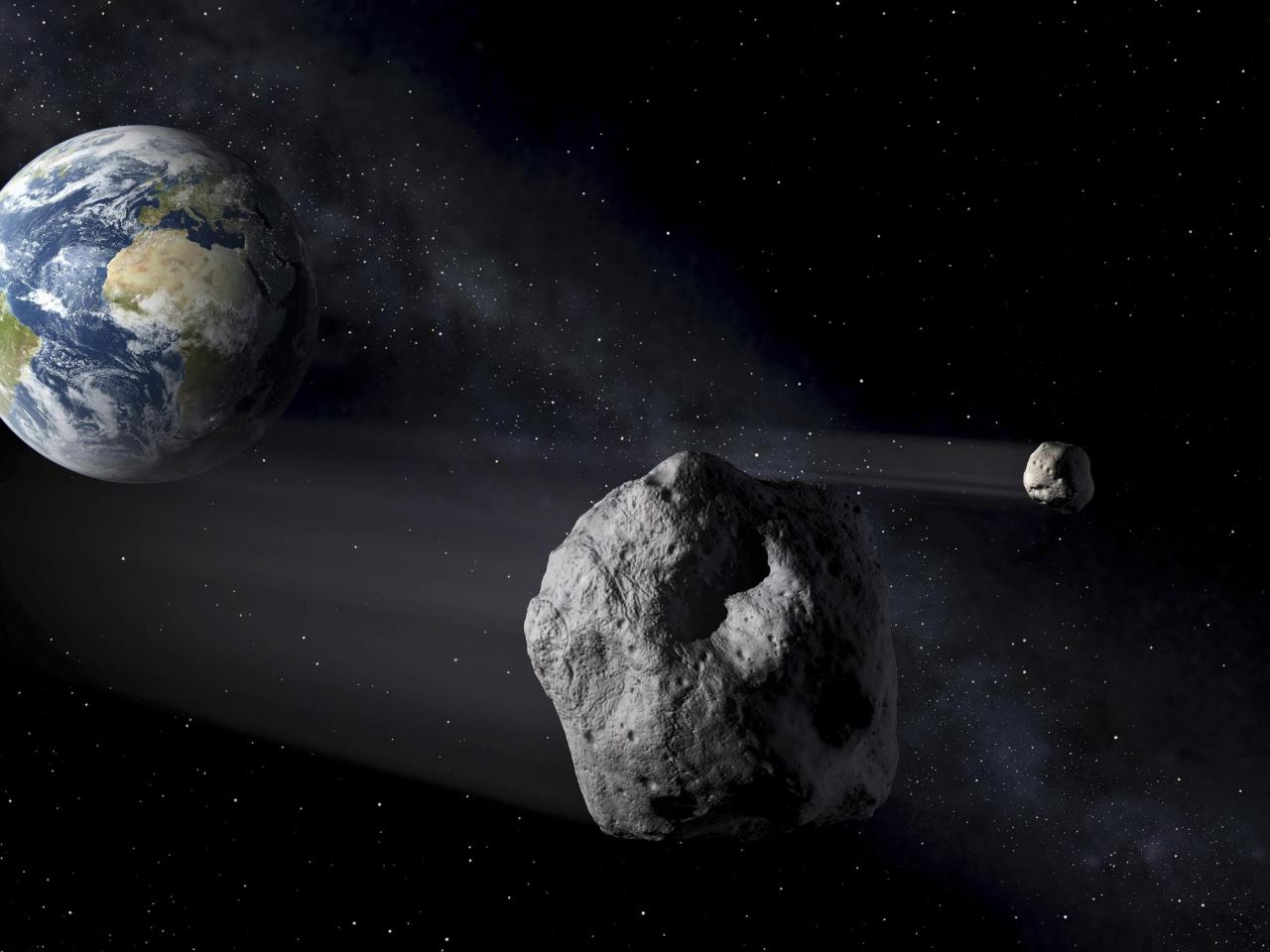 A harmless asteroid will whiz past Earth Saturday. Here's how to spot it