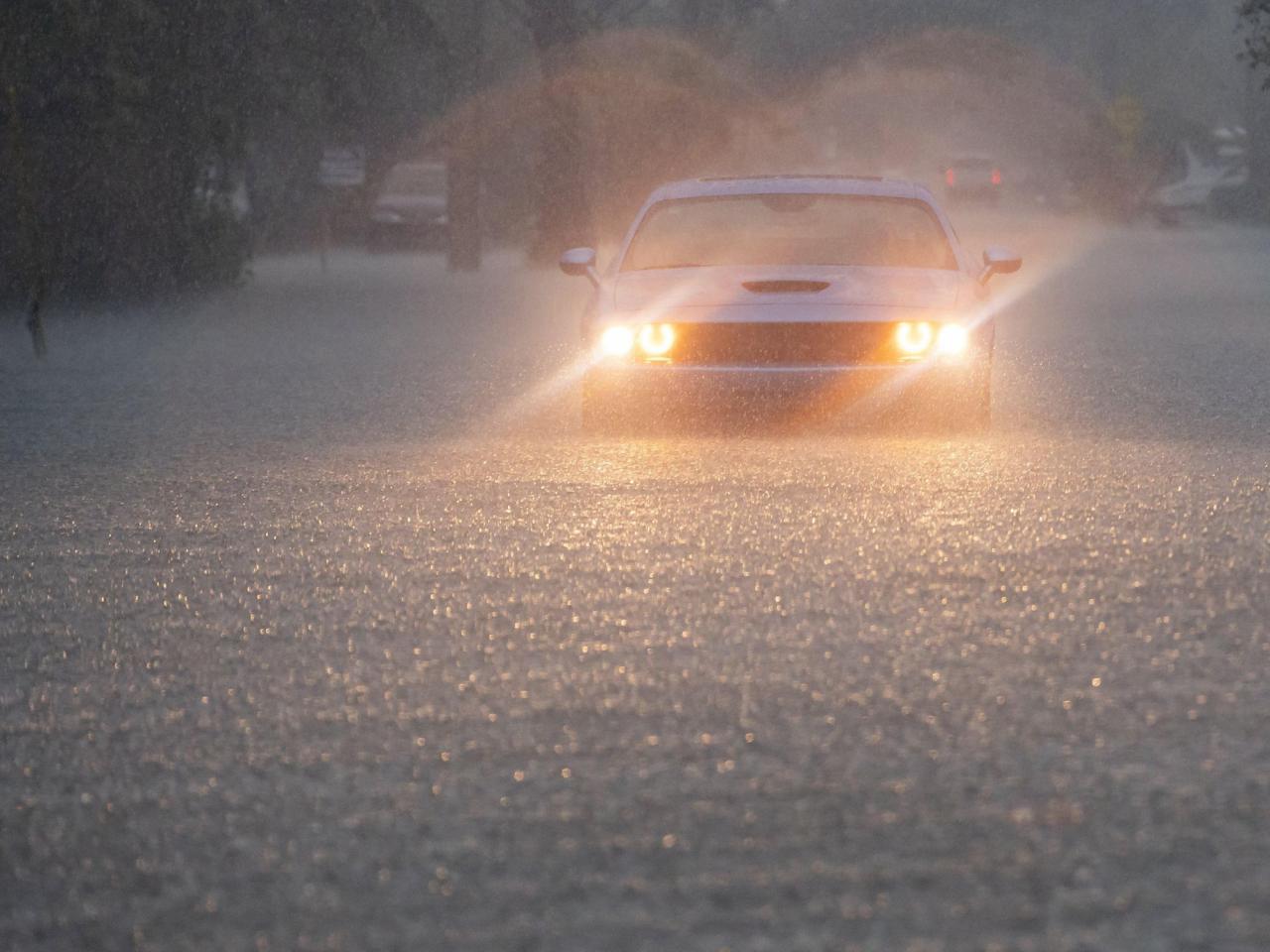 Much of US braces for extreme weather, from southern heat wave to possible snow in the Rockies