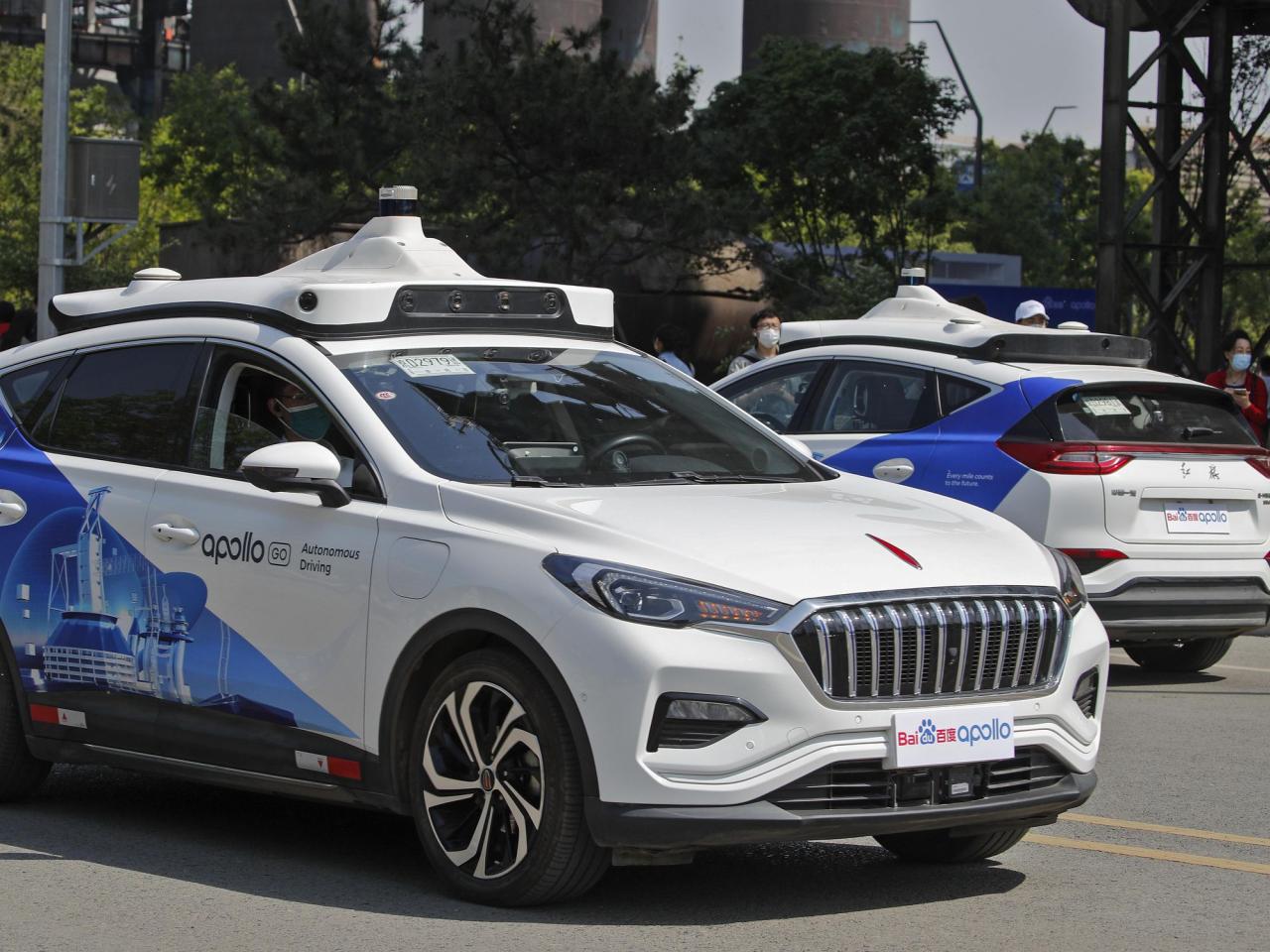 A driverless car hits a person crossing against the light in China, highlighting a challenge for AI