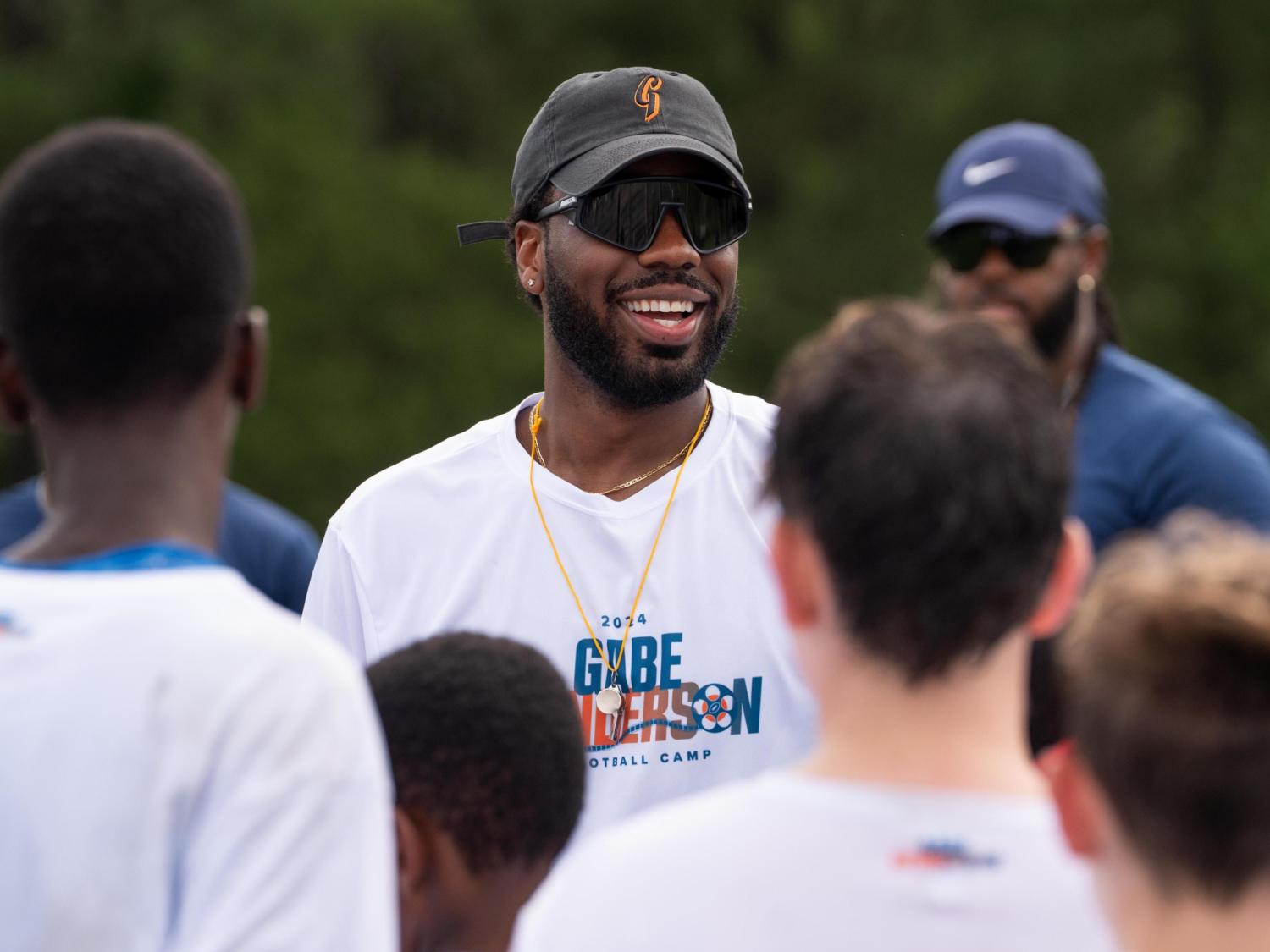 Former Southeast Raleigh QB returns home to provide opportunities for youth football players