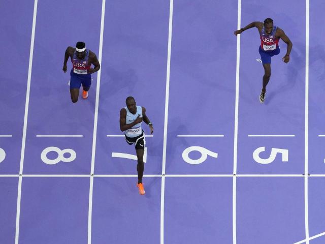 COVID-stricken Noah Lyles collapses after getting bronze, one of 8 US medals at Olympic track :: WRALSportsFan.com