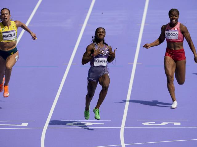 Sha'Carri breezes through opening round at first-ever Olympics race, wins 100 heat in 10.94 seconds :: WRALSportsFan.com