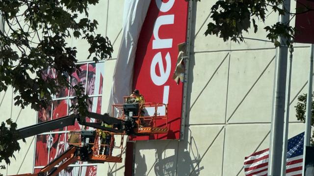 Lenovo signage installation begins at Hurricanes arena :: WRALSportsFan.com