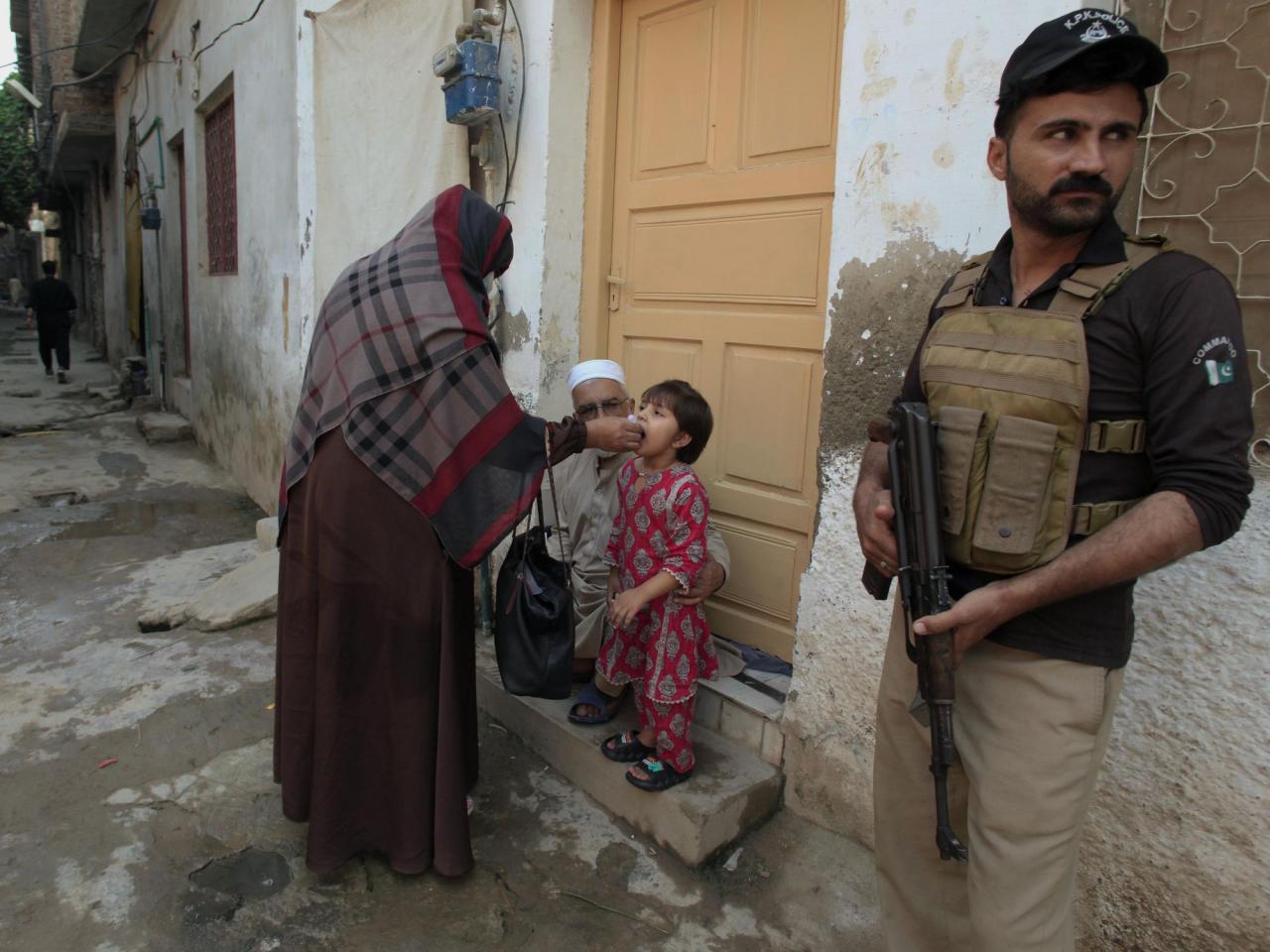 Attack on a health center used in an anti-polio campaign in Pakistan kills 2 police officers