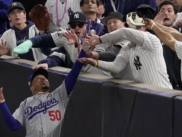 Yankee Stadium fans ejected after one pries ball out of Mookie Betts' glove at World Series :: WRALSportsFan.com