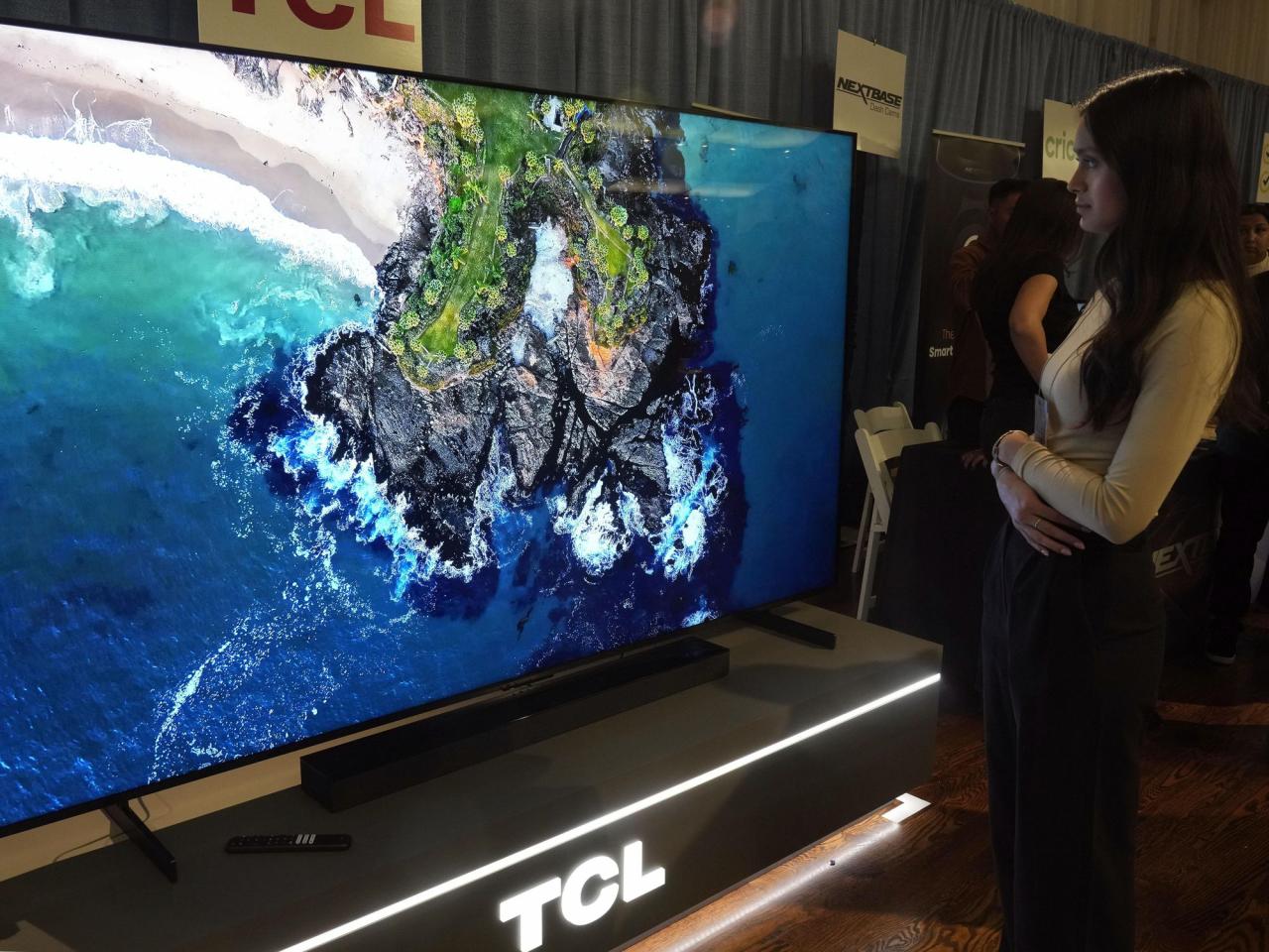 A TV as big as a bed? With the holidays approaching, stores stock more supersize sets