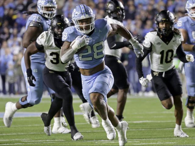 Hampton's huge day helps North Carolina hold off Wake Forest 31-24 to reach bowl eligibility :: WRALSportsFan.com