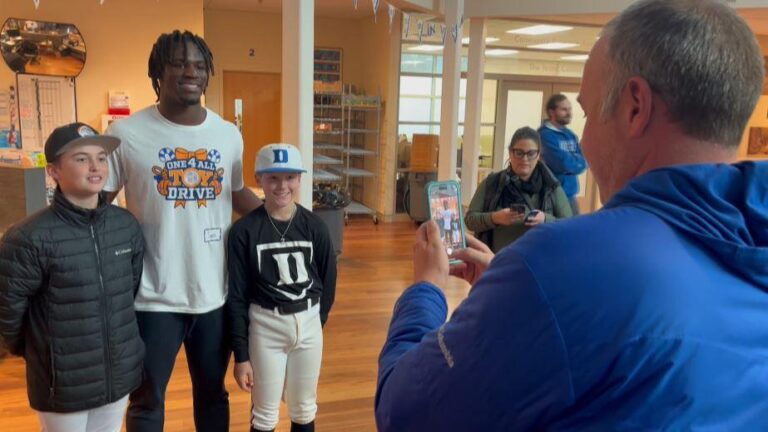 Duke's Sion James makes impact in new home with toy drive :: WRALSportsFan.com