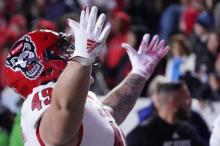 UNC, NC State athletic directors release statement after NC State player tries to plant flag on field after rivalry game :: WRALSportsFan.com