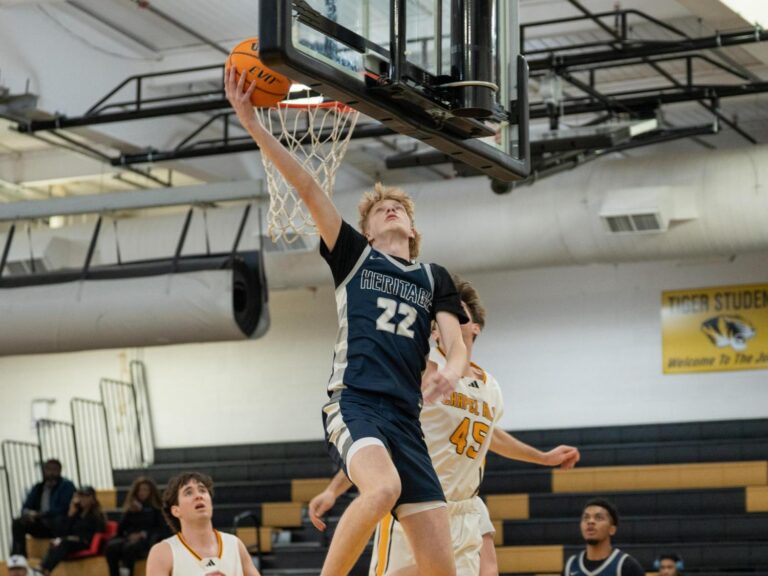 Heritage holds off Chapel Hill to advance in 4A boys basketball playoffs